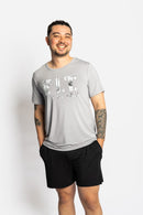 Man wearing the Rest Day PJ F.I.T. grey pyjama t-shirt and shorts set, full set on model